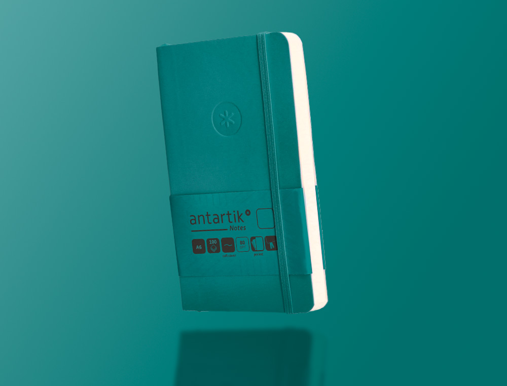 CARNET A6 ANTARTIK NOTES PAPIER UNI IVOIRE COUVERTURE SOUPLE FERMETURE ELASTIQUE 100PAGES 80GR COLORIS VERT PAON